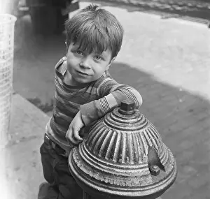Fire Hydrant Prints: Boy Leans Nonchalantly On Fire Hydrant