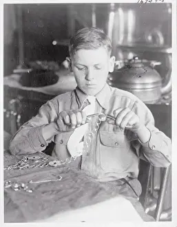 Rhode Island Prints: Boy Making Novelty Chains