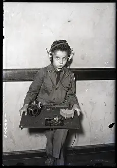 Cadet Prints: Boy Operates First Radio Built Shown