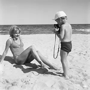 Tropez Prints: Boy Photographing Reclining Woman