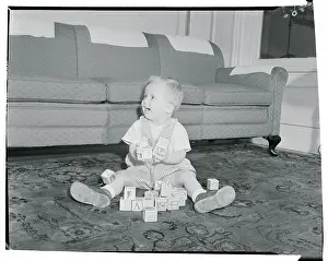 Robert J Prints: Boy Playing with Blocks