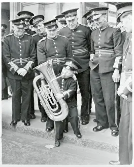 Boy Playing a Brass Instrument