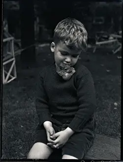 Sweater Prints: Boy Playing with Pet Squirrel