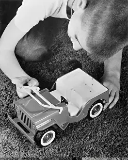Toy Vehicle Prints: Boy Playing with Toy Jeep