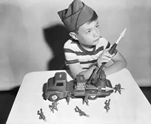 Toy Vehicle Prints: Boy Playing with Toy Missile Launcher and Soldiers