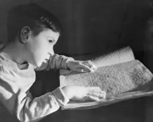 Blind Prints: Boy Reading Braille Book