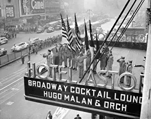 Boy Scouts Salute Atop Hotel Astor Sign