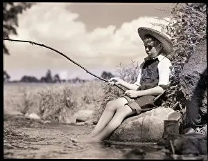 Overalls Prints: Boy Seated Fishing In Stream