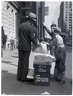 Buying Prints: Boy Selling Newspapers on Sidewalk