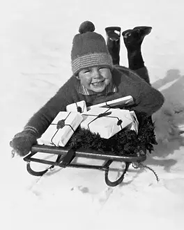 Sled Prints: Boy on Sled with Christmas Gifts