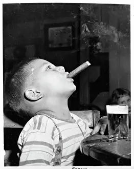 Boy Smoking Cigar