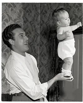 Uncle Prints: Boy Standing In The Palm Of An Adult