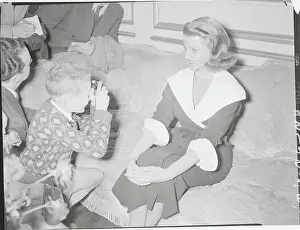 Boy Taking Picture of Rita Hayworth