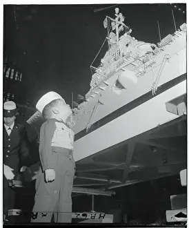 Boy Viewing Model Boat