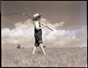 boy holding fishing pole Posterazzi Low angle view of dead Poster Print, (18 x 24): Posters & Prints 49,029 Boy Fishing Royalty-Free Images,