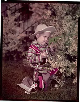 Arlington Prints: Boy Wearing a Cowboy Outfit