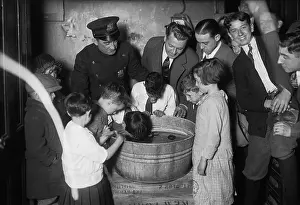 Quality Time Prints: Boys (7-8 years) taking part in apple competition. October 25, 1925