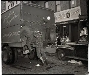 Boys Hop a Ride on at Truck