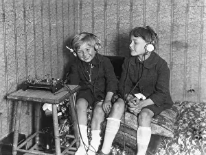Two Boys Listen To Crystal Radio Set