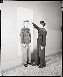 Measuring Prints: Boys Measuring Each Other