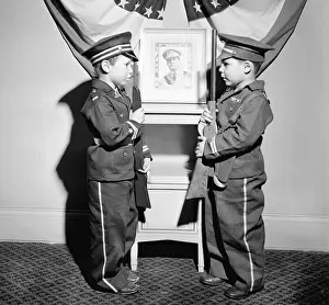 Boys in Military Costume Posing Face to Face