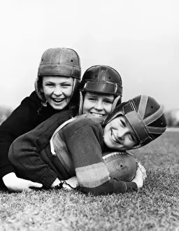 Bonding Prints: Three boys playing American football
