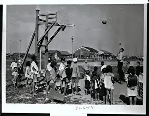 Boys Playing Basketball Outside