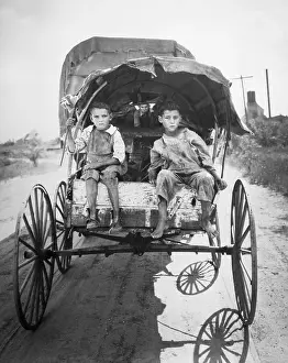 Two Boys Riding in a Wagon