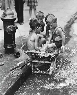 Splashing Prints: Boys Splashing by a Fire Hydrant