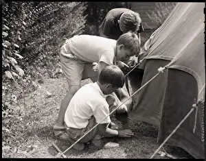 Boys Behind Tent