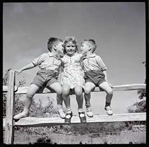 Whispering Prints: Boys Vying for Girl's Attention
