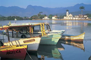 Brazil, Rio de Janeiro, Parati, boats moored in bay, town in background