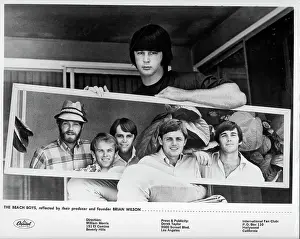 Brian Wilson Holds A Mirror Reflecting The Other Beach Boys