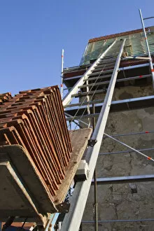 Roof Tile Collection: Brick elevator at a construction site