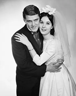 Aspirations Collection: Bride and groom hugging