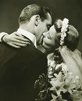 Aspirations Collection: Bride and Groom kissing in studio, (B&W)