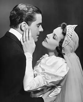 Black Colour Prints: Bride and groom looking in eyes (B&W)