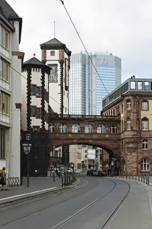 Hesse Gallery: Bridge of Sights (SeufzerbrAOEcke) in the historic center and modern skyscraper in the background in Frankfurt am Main