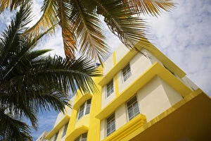 Bright yellow and white facade of residential building in Miami Beach, Miami, Florida