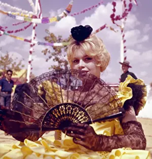 Prints of Portrait of French actress Brigitte Bardot in Spanish dress holding a fan, circa 1965. (Photo by Archive Photos/Getty Images) Iconic Movie Star Prints (1920s–1970s): Brigitte Bardot