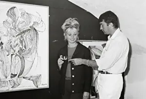 Tropez Prints: Brigitte Bardot Standing with Jacques Dussart