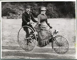 Teamwork Prints: British Couple Riding Tricycle