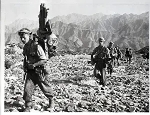Aden Prints: British Paratroopers Traverse Rocky Terrain in Aden