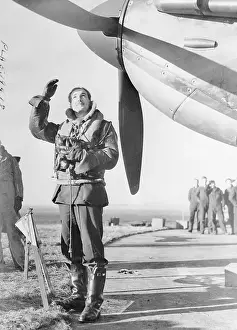 British Pilot Waving Underneath Airplane