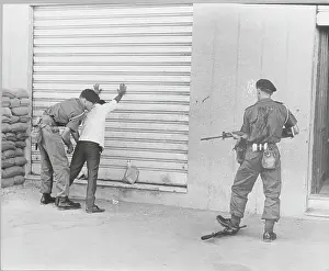British Soldier Frisking Man During Aden Unrest