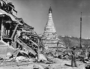 Bomb Prints: British Soldier Inspects Bomb Damage