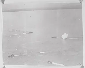Opposites Prints: British Vessel After German U Boat