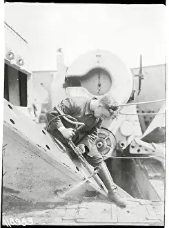 Heligoland Prints: British Worker Dismantling Heligoland Weaponry Structure