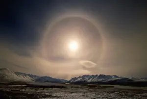 Alaska Us State Prints: Brooks Range, circle of ice surrounding sun after autumn snowstorm near Galbraith Lake