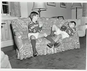 Boxing Through the Ages: A Stunning Visual Journal: Brothers Taking Break from Boxing